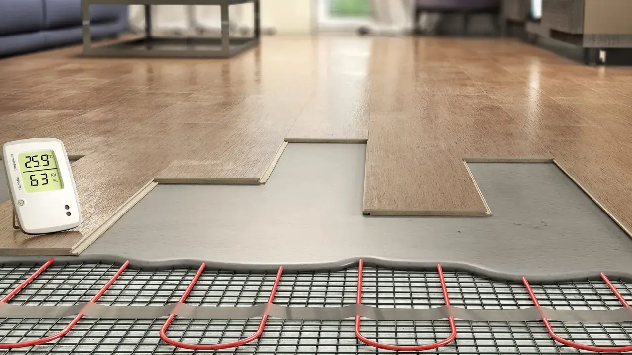 Instalación de suelo radiante con termómetro mostrando 25.9°C, ideal para una temperatura suelo refrescante y confortable.