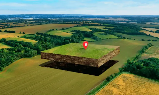 Un trozo de tierra flotante con un marcador de casa, listo para ser un fondo edificable en un paisaje rural.